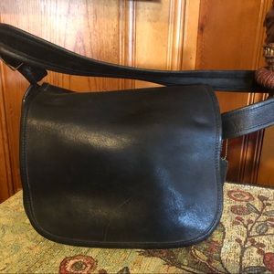 Black leather Coach shoulder bag.